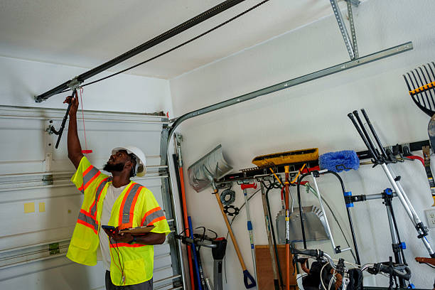 Professional Garage Door Panel Replacement technician working in Calais, ME